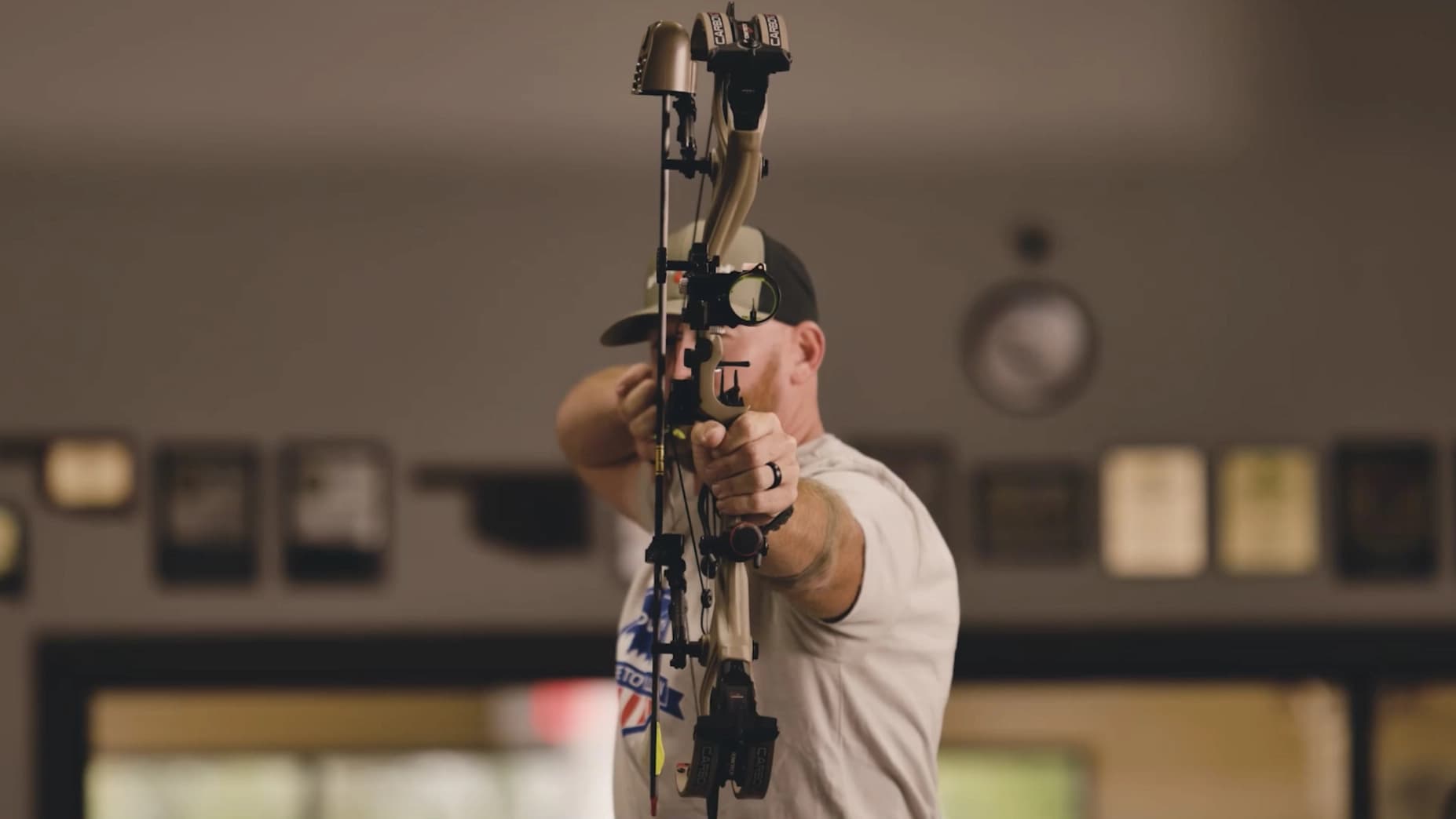 Man holding a Bowtech bow