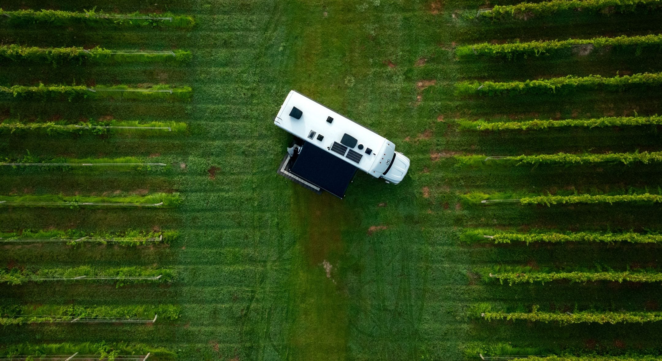 Dometic Van in the middle of a field